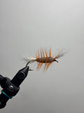 Single wing brown body orange hackle bomber